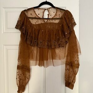 Free People sheer blouse. Brown with beaded embellishment. Size S.